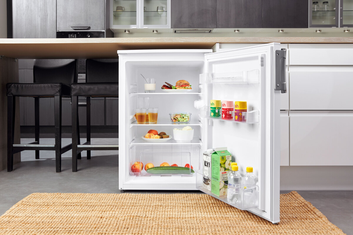 Open fridge in kitchen