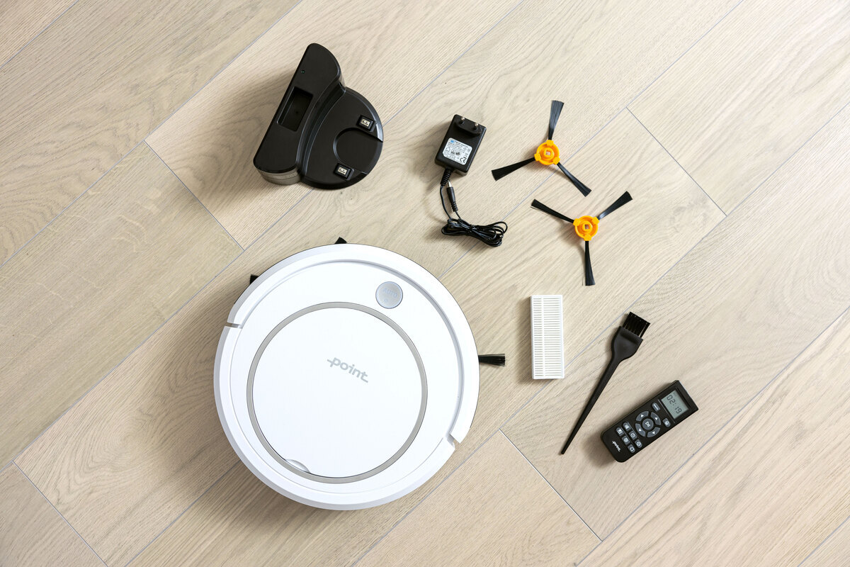 Robot vacuum cleaner and accessories on the floor