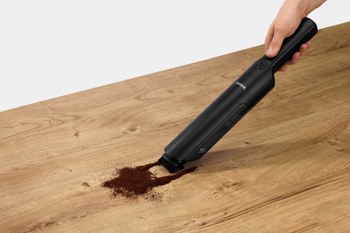 POINT CRAYON HANDHELD VACUUM CLEANER BK vacuuming ground coffee