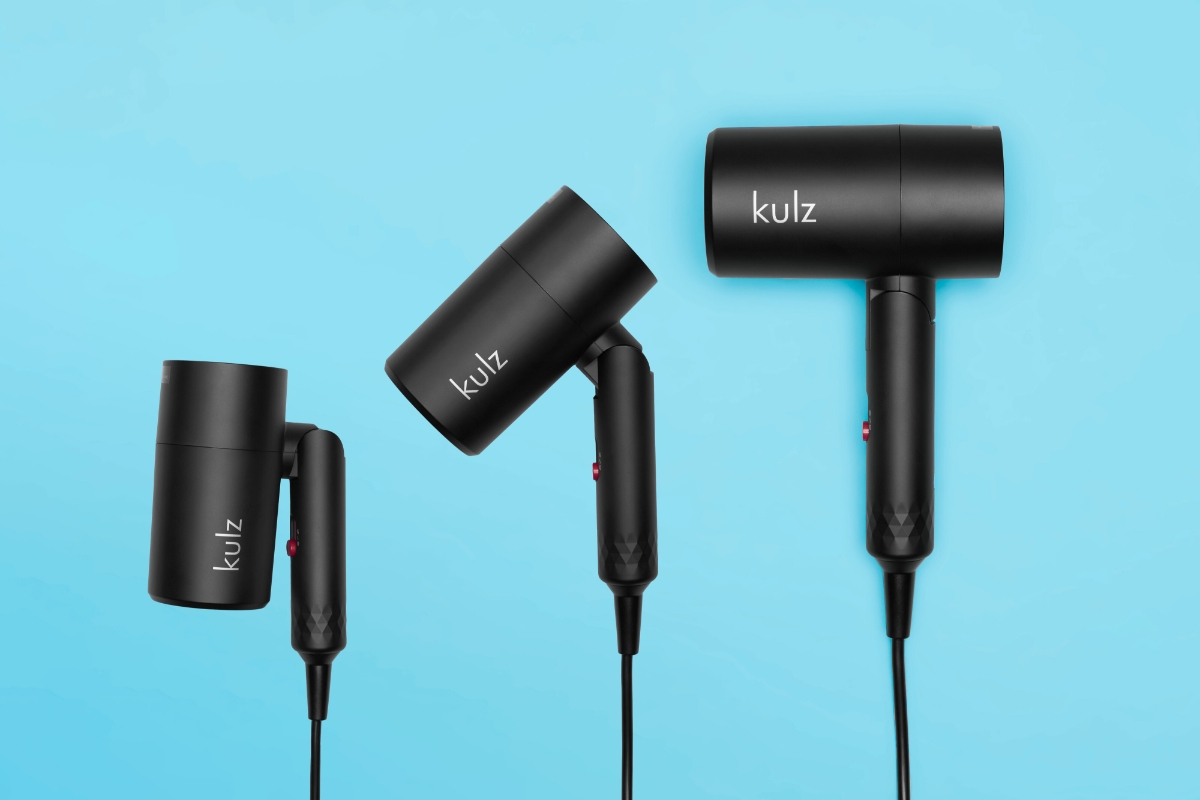 KULZ JETSET BLOW TRAVEL HAIR DRYER on blue background in three different positions