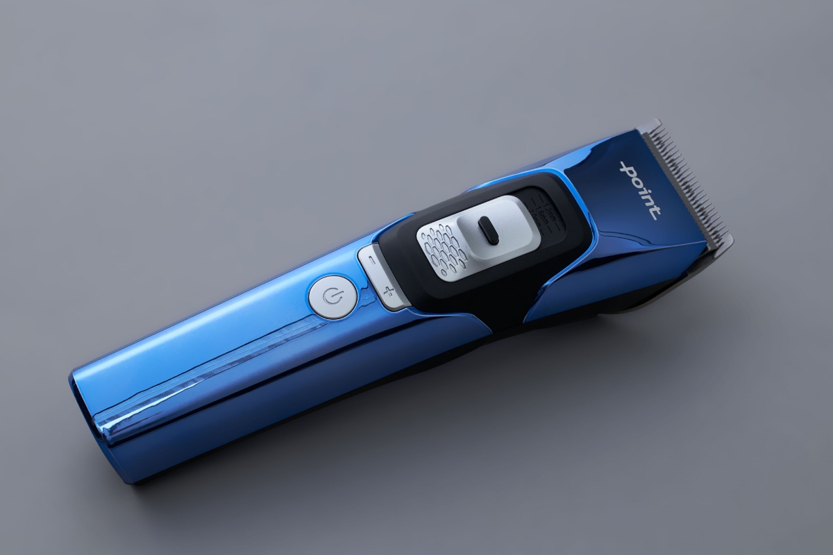 Wide angle image of POINT TRIM TECH BEARD TRIMMER on dark grey background