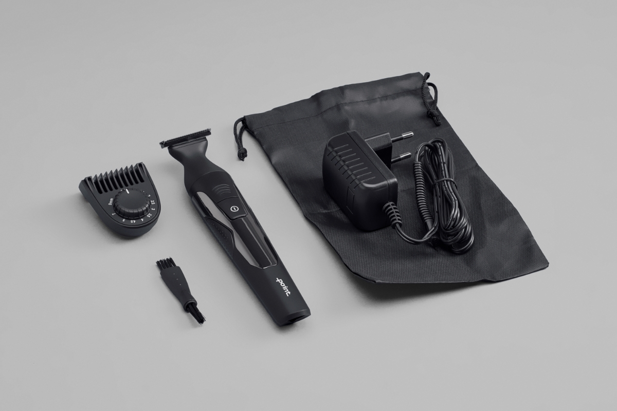 POINT RAPID GROOM BEARD TRIMMER and its accessories and travel pouch laid out on a grey background