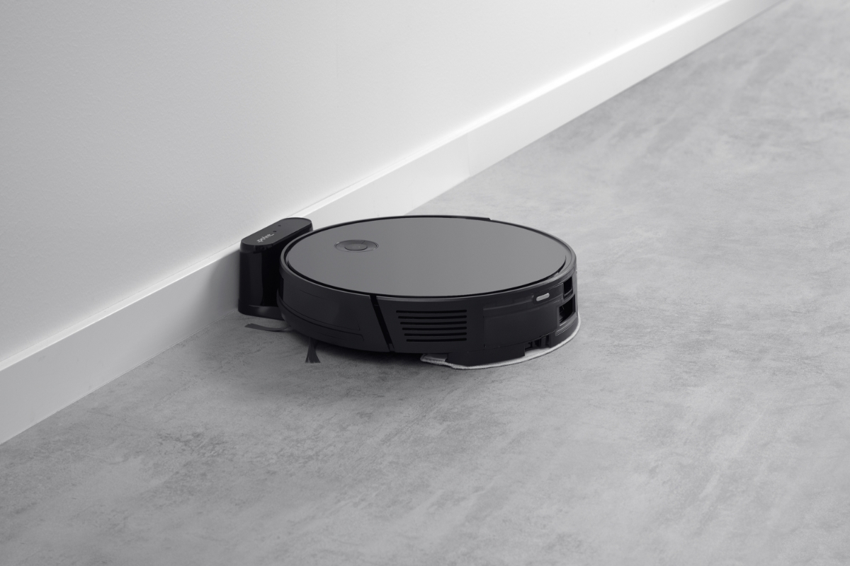 POINT DUSTY600 ROBOT VACUUM CLEANER docked in its charging dock 