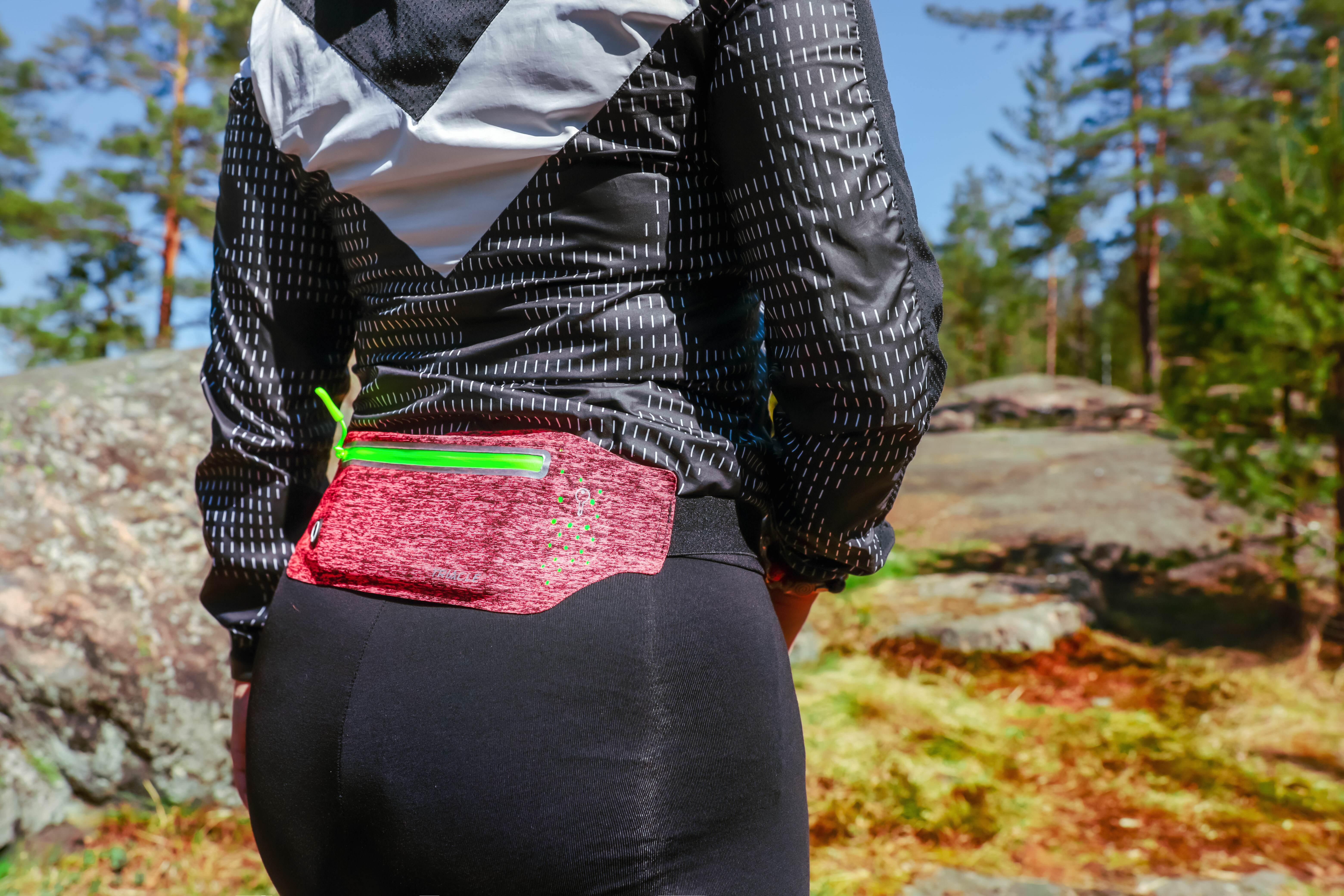 Woman wearing Triacle waist bag