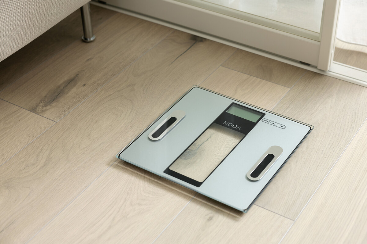 Body composition scale on the livingroom floor