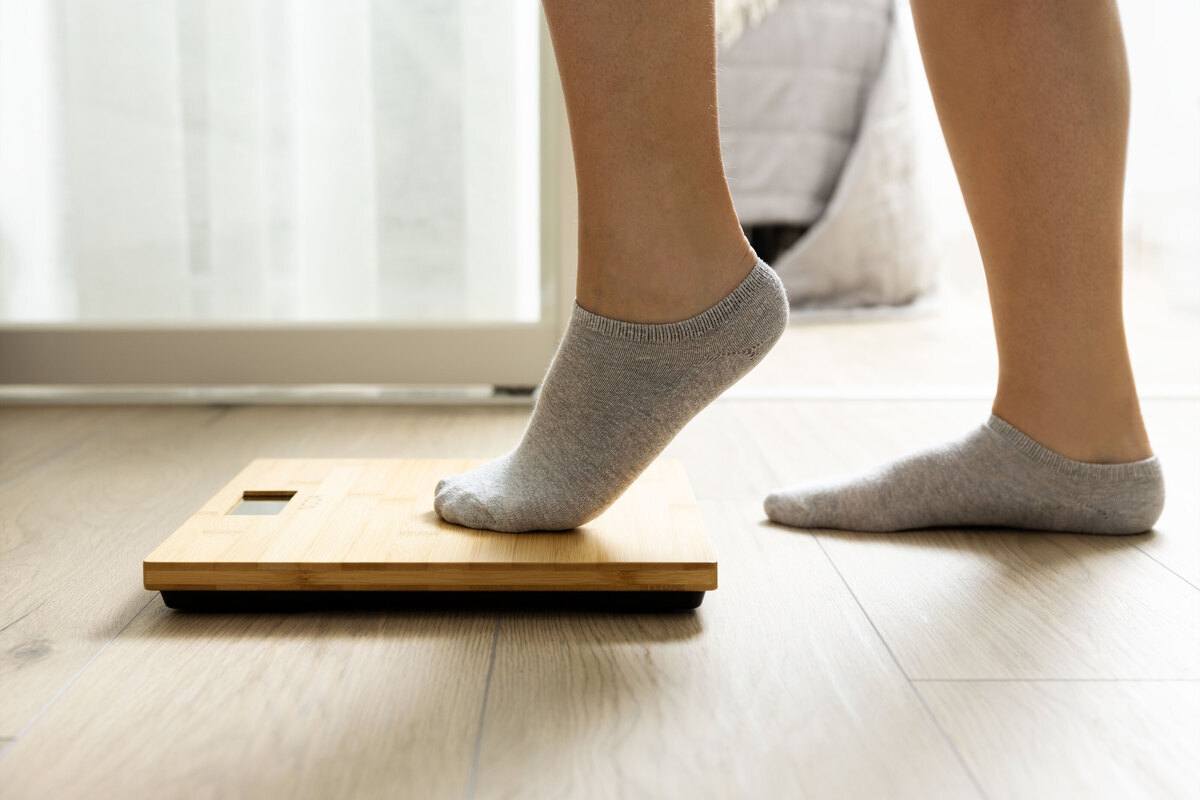 Person stepping on the scale