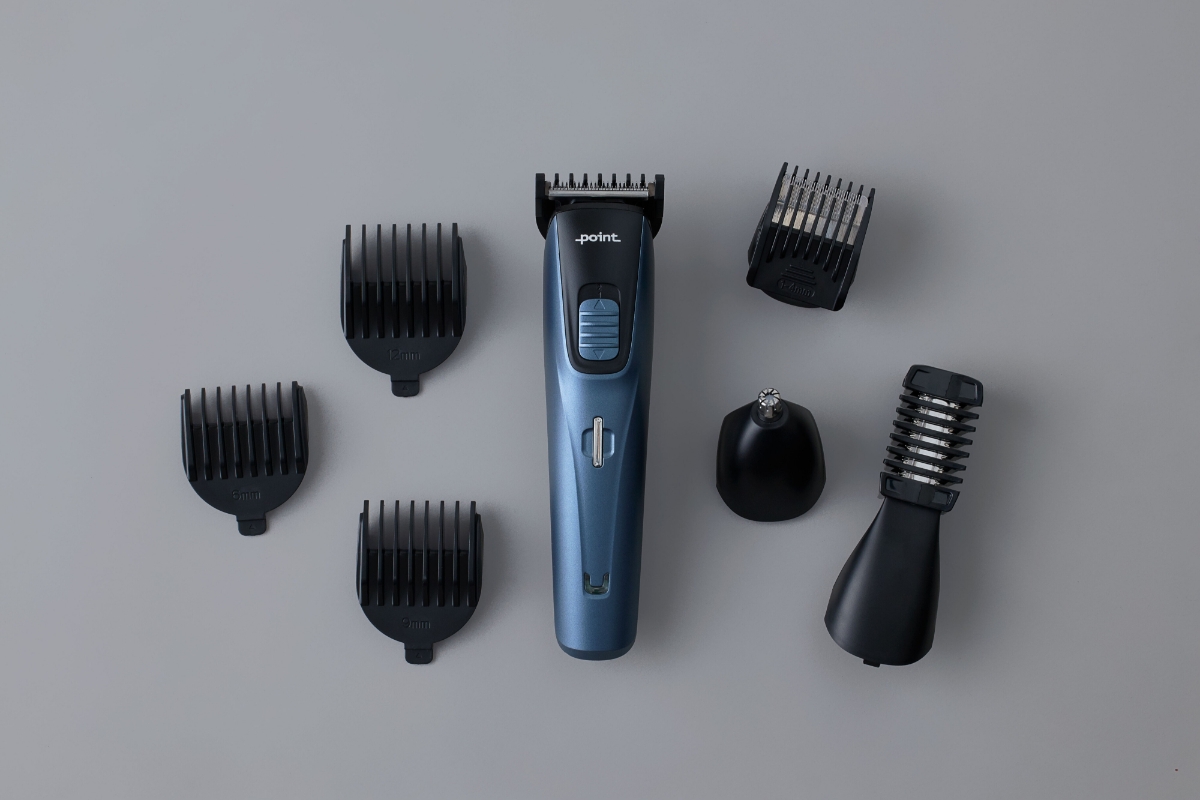 Wide angle image of POINT PRECISION PRO MULTI GROOMER and its accessories on dark grey background