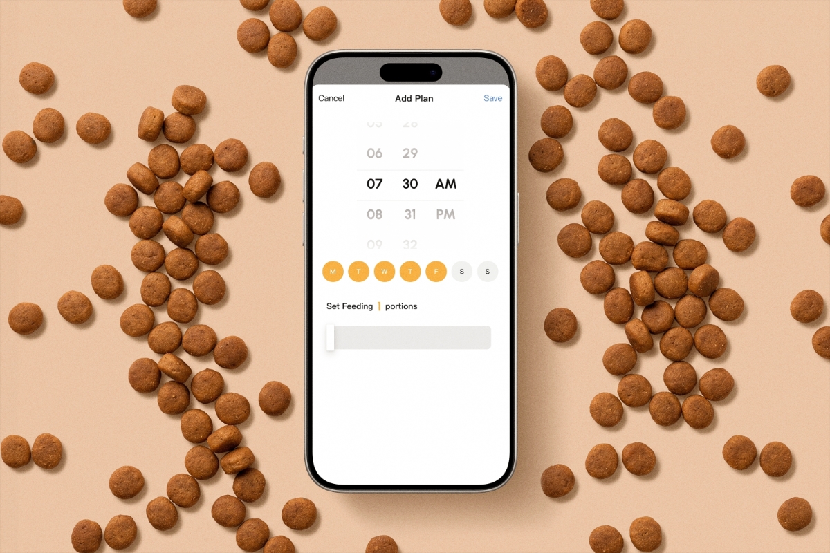 A smartphone with a pet app opened on the screen with a beige background and some dry pet food next to the smartphone