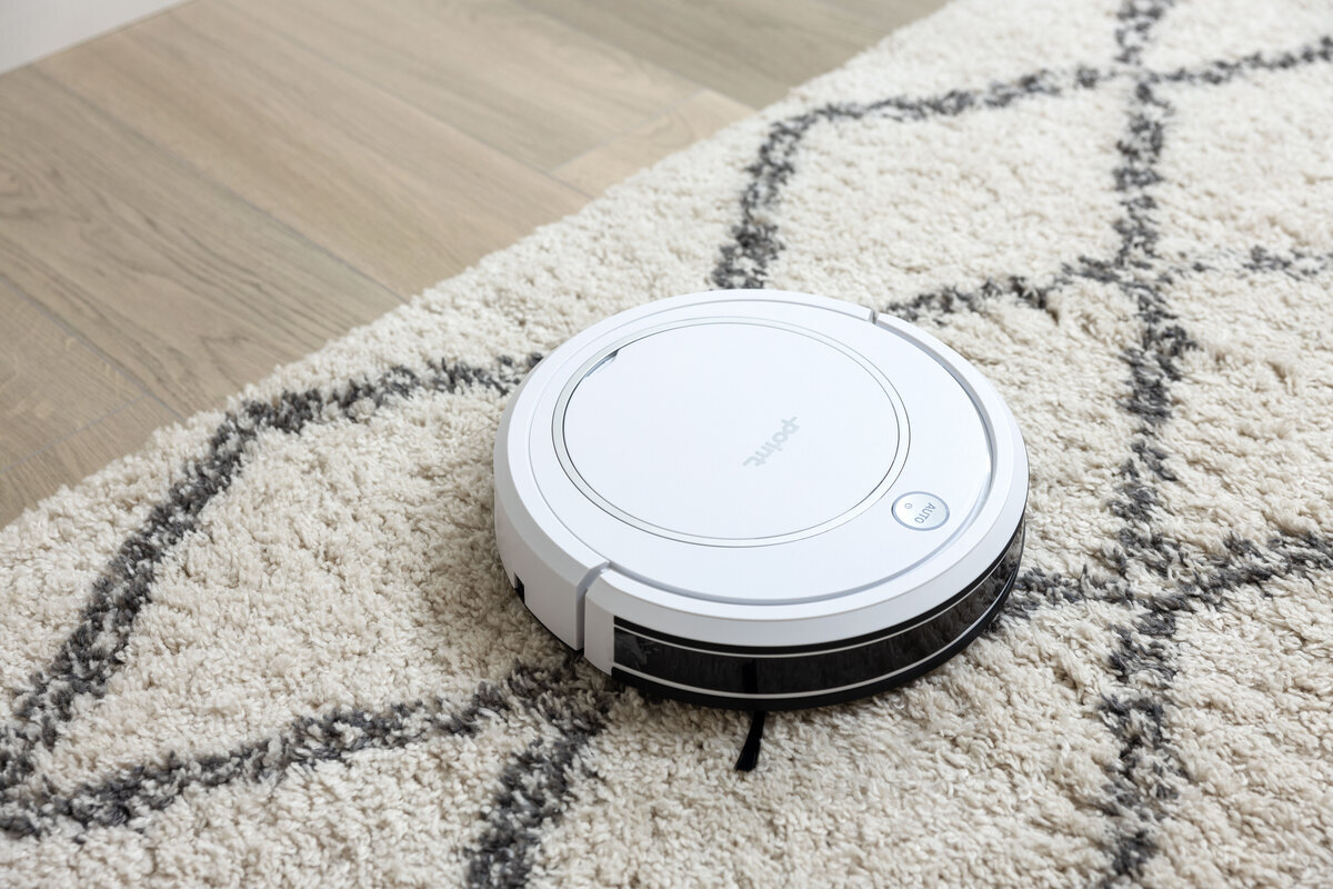 Robot vacuum cleaner on the carpet