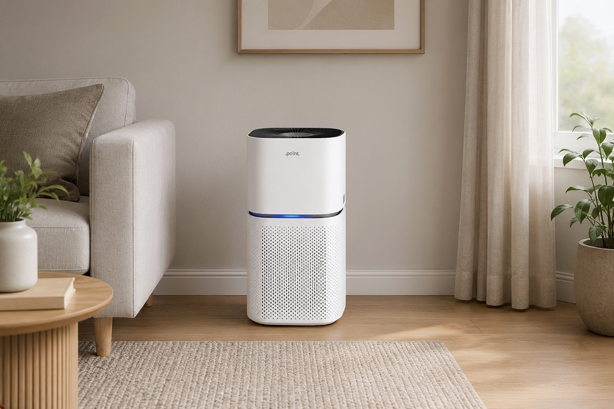 POINT POAP350 AIR PURIFIER A white Point POAP350 air purifier in a children's room on a wooden floor with child's toys and a bed next to the purifier